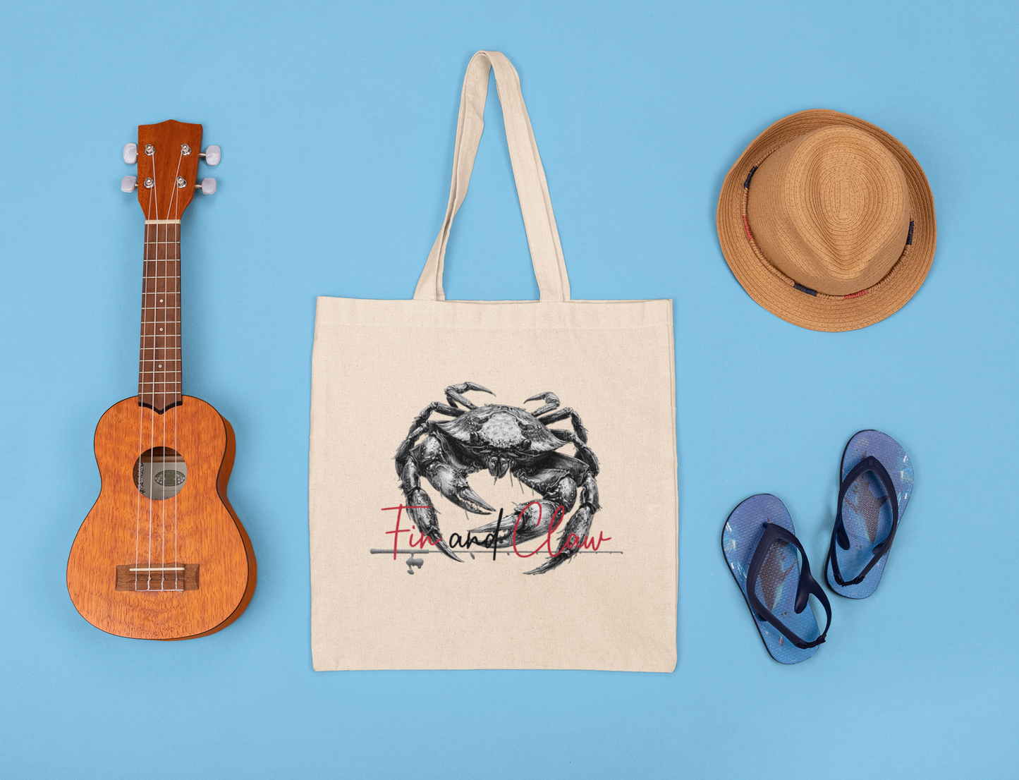 Canvas tote bag featuring the Fin and Claw Dungeness Crab design.